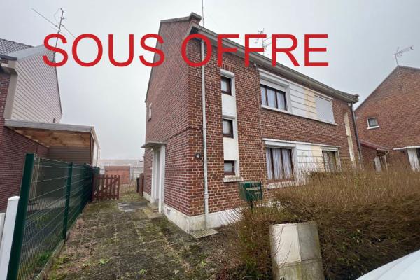 Semi individuelle de 72m2 + garage à rénover, bâtie sur 261m