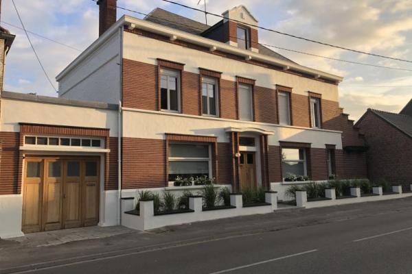 Maison de style bourgeoise double distribution développant 2