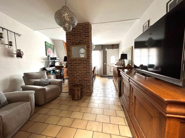 Maison 1930 mitoyenne de 66,65m2 bâtie sur une parcelle de 1