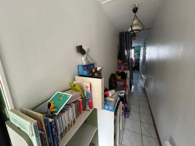 Maison 1930 mitoyenne développant 60m2 de superficie et bâti