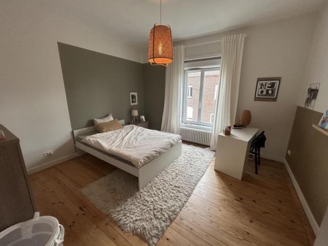 Maison de style bourgeoise double distribution développant 2