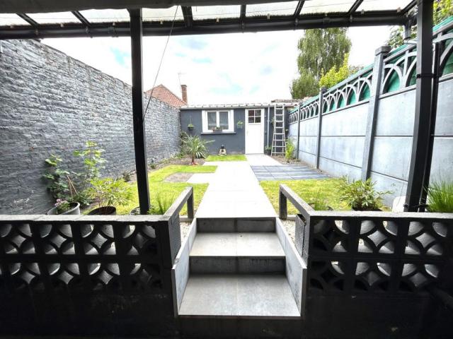 Maison 1930 mitoyenne de 66,65m2 bâtie sur une parcelle de 1