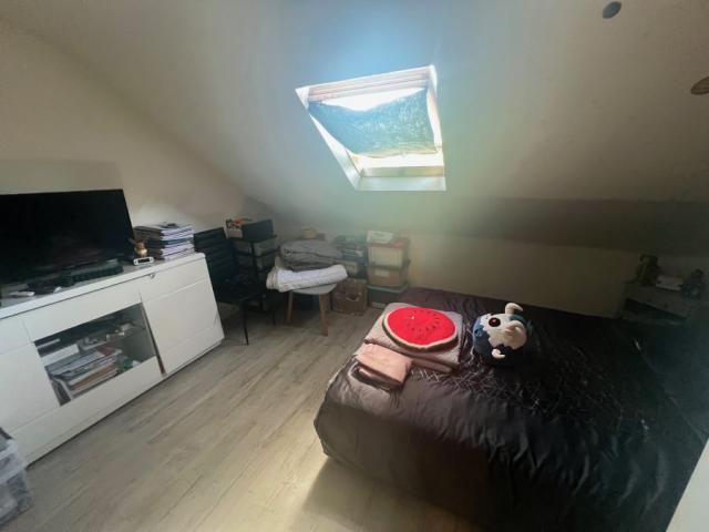 Maison mitoyenne de 69m2 utiles actuellement louée bâtie sur