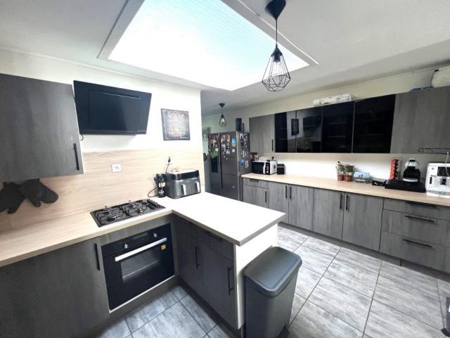 Maison de ville mitoyenne de 108,51m2 bâtie sur une parcelle