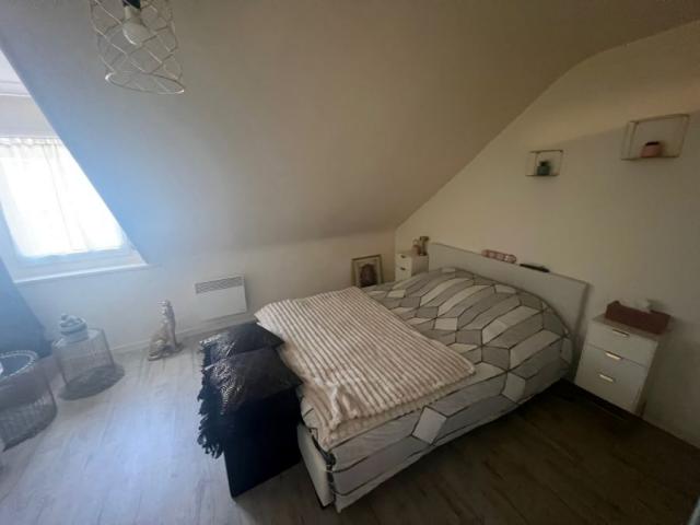 Maison mitoyenne de 69m2 utiles actuellement louée bâtie sur