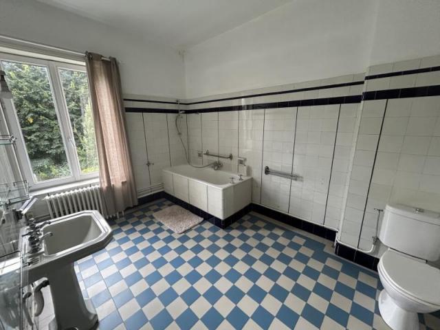 Maison de style bourgeoise double distribution développant 2