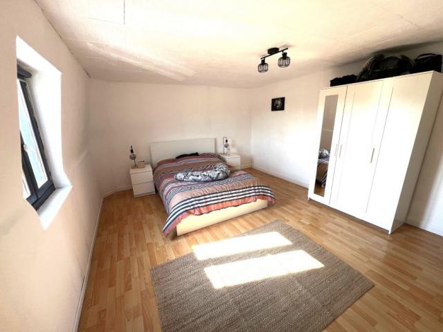 Maison de ville mitoyenne de 108,51m2 bâtie sur une parcelle