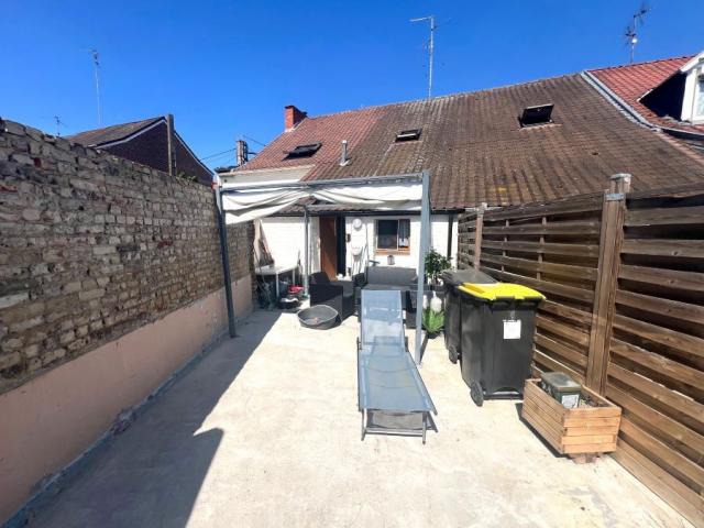 Maison mitoyenne de 69m2 utiles actuellement louée bâtie sur