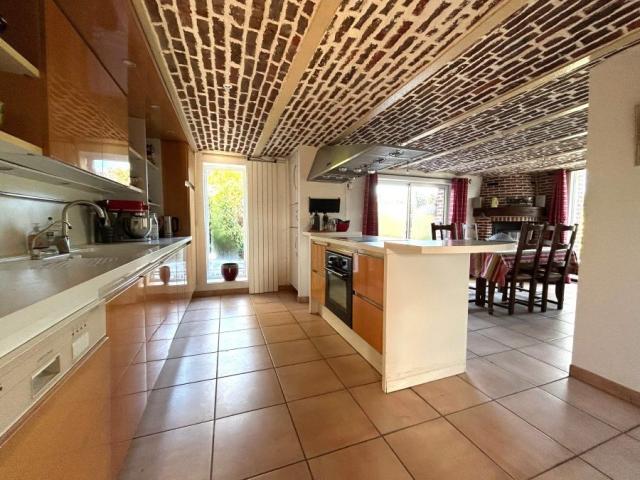 Fermette en L individuelle de 212m2 bâti sur une parcelle de