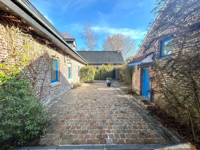 Fermette en L individuelle de 212m2 bâti sur une parcelle de