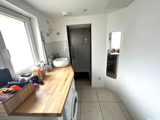 Maison de ville mitoyenne des années 30 développant 73,38m2 
