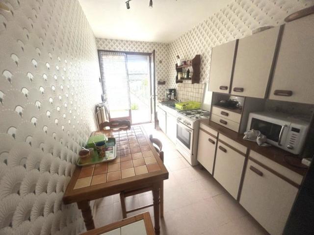 Maison de ville mitoyenne de 72,75m2 bâtie sur 183m2 de terr