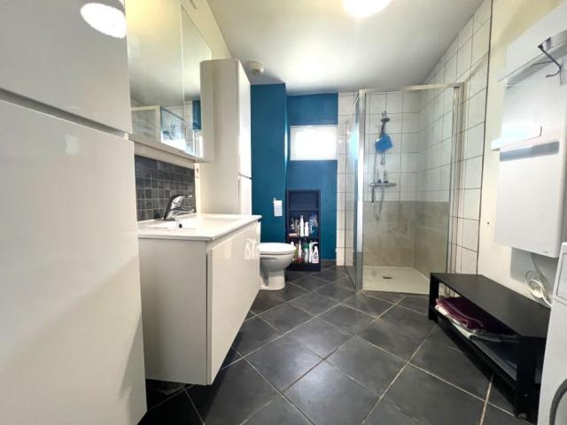 Maison individuelle style loft semi plain-pied située dans u