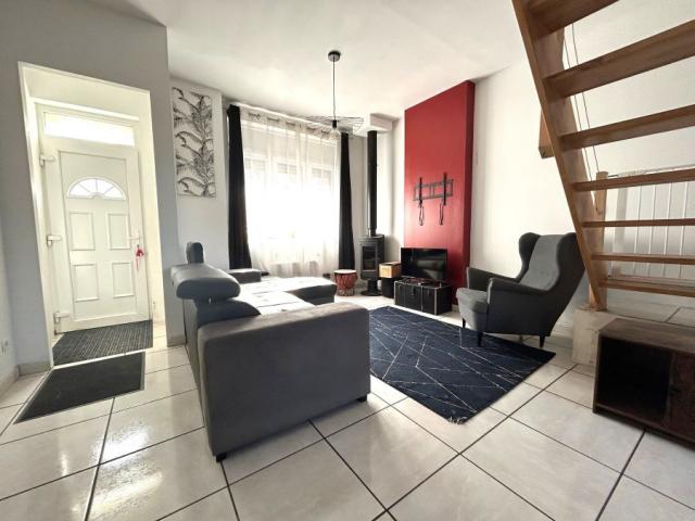Maison de ville mitoyenne des années 30 développant 73,38m2 