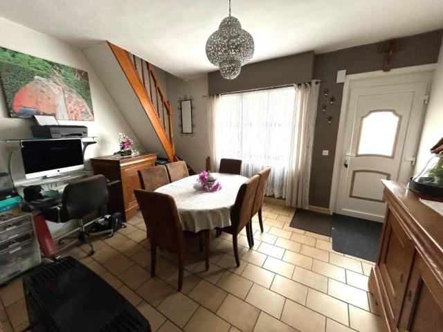 Maison 1930 mitoyenne de 66,65m2 bâtie sur une parcelle de 1