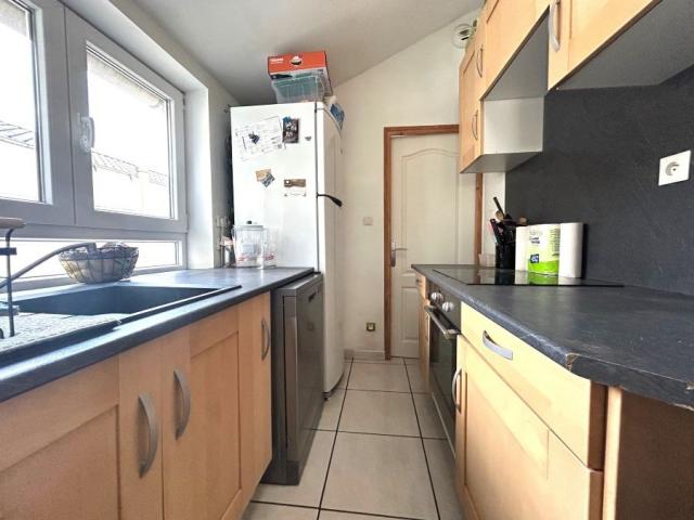 Maison de ville mitoyenne des années 30 développant 73,38m2 