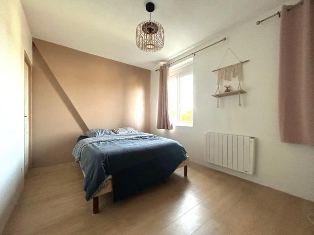 Maison de ville mitoyenne des années 30 développant 73,38m2 