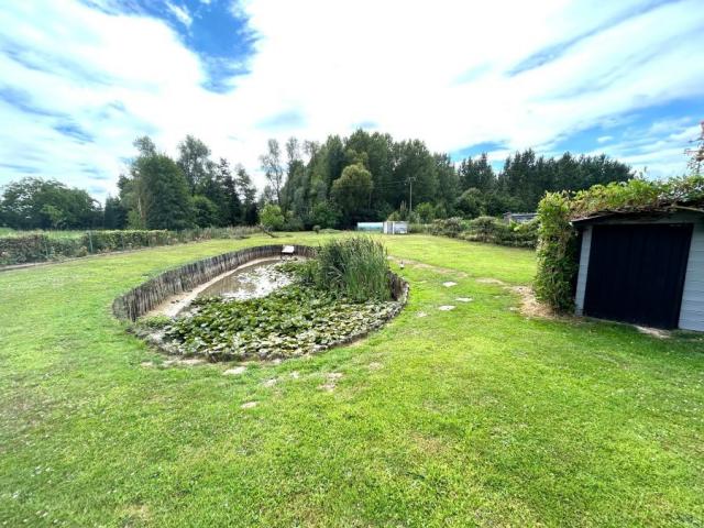 Beau plain pied individuel des années 90 développant 128m2 h