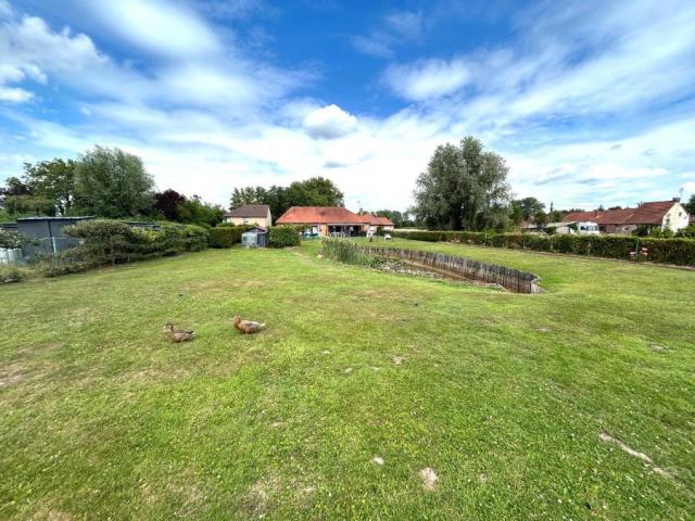 Beau plain pied individuel des années 90 développant 128m2 h