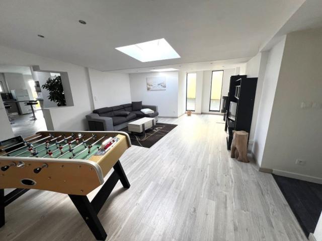 Maison individuelle style loft semi plain-pied située dans u